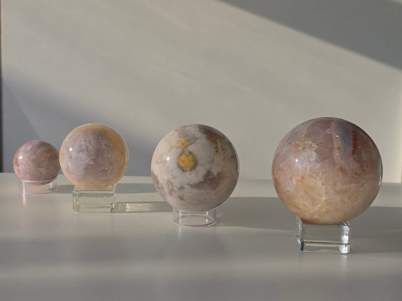 Luxury crystal sphere collection by Stone and Bloom featuring premium statement pieces curated for intentional living and elevated interiors ✧🤍✧