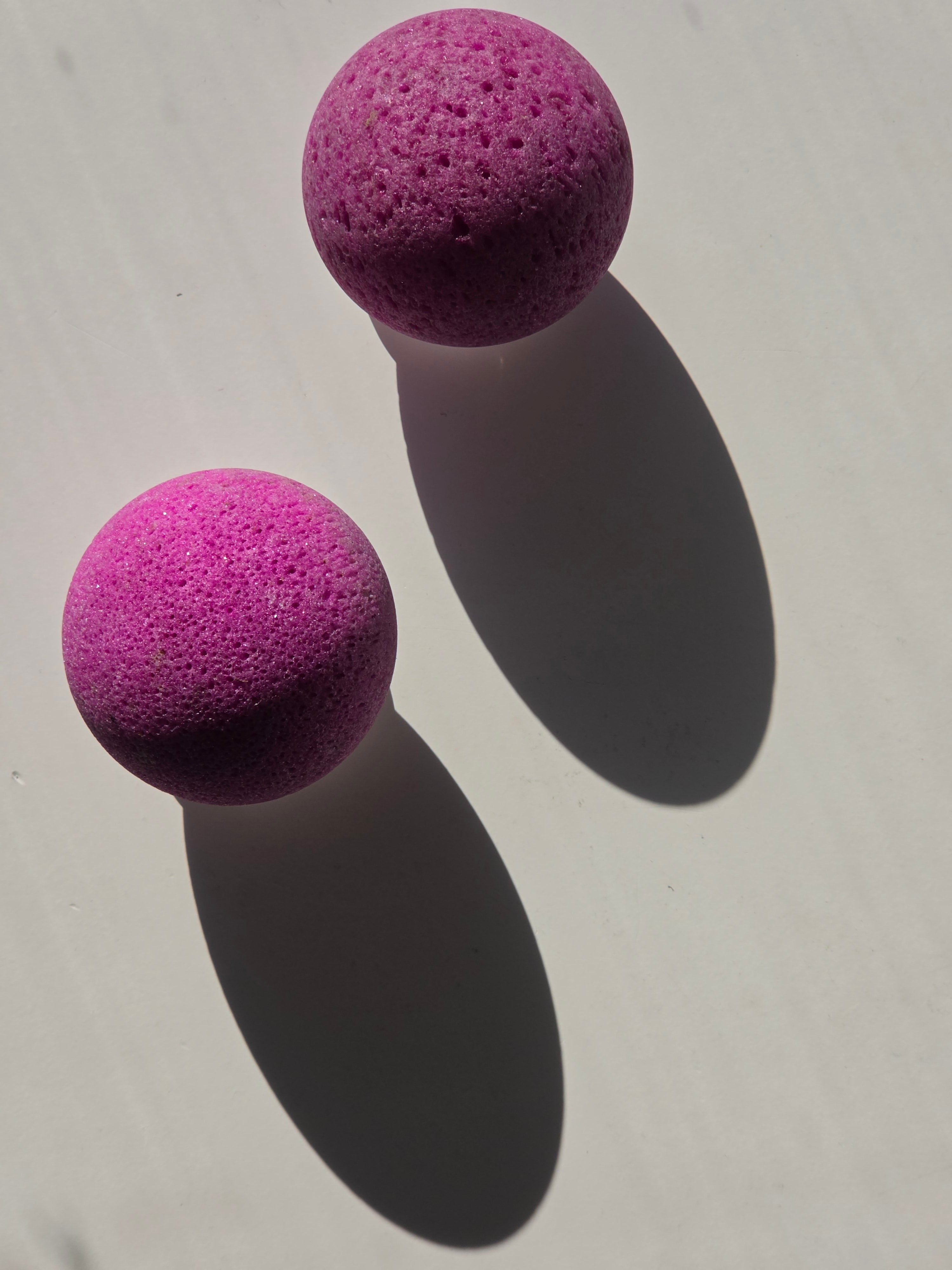 High quality Natural Ruby crystal sphere with vibrant berry-red colouring and premium polished finish curated by Stone and Bloom.