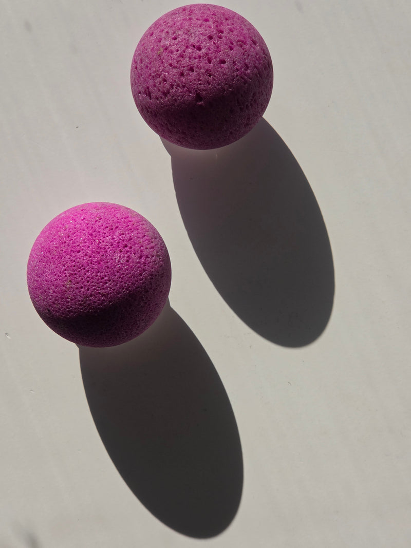 High quality Natural Ruby crystal sphere with vibrant berry-red colouring and premium polished finish curated by Stone and Bloom.