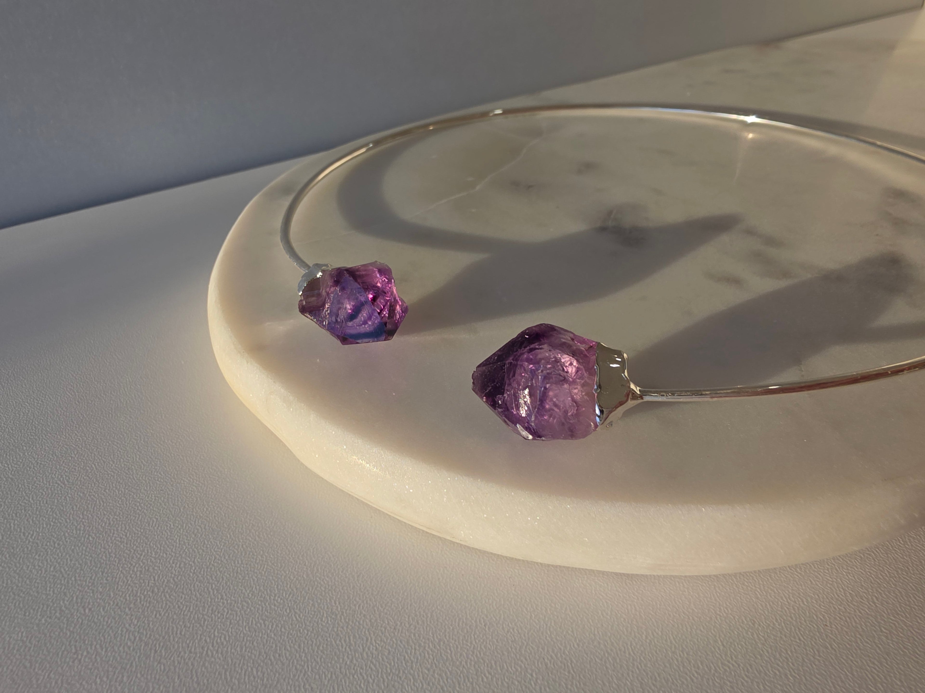 Stone & Bloom Raw Luxe Jewellery Collection of genuine natural crystal jewellery including raw amethyst pendants, crystal rings and silver-plated designs.