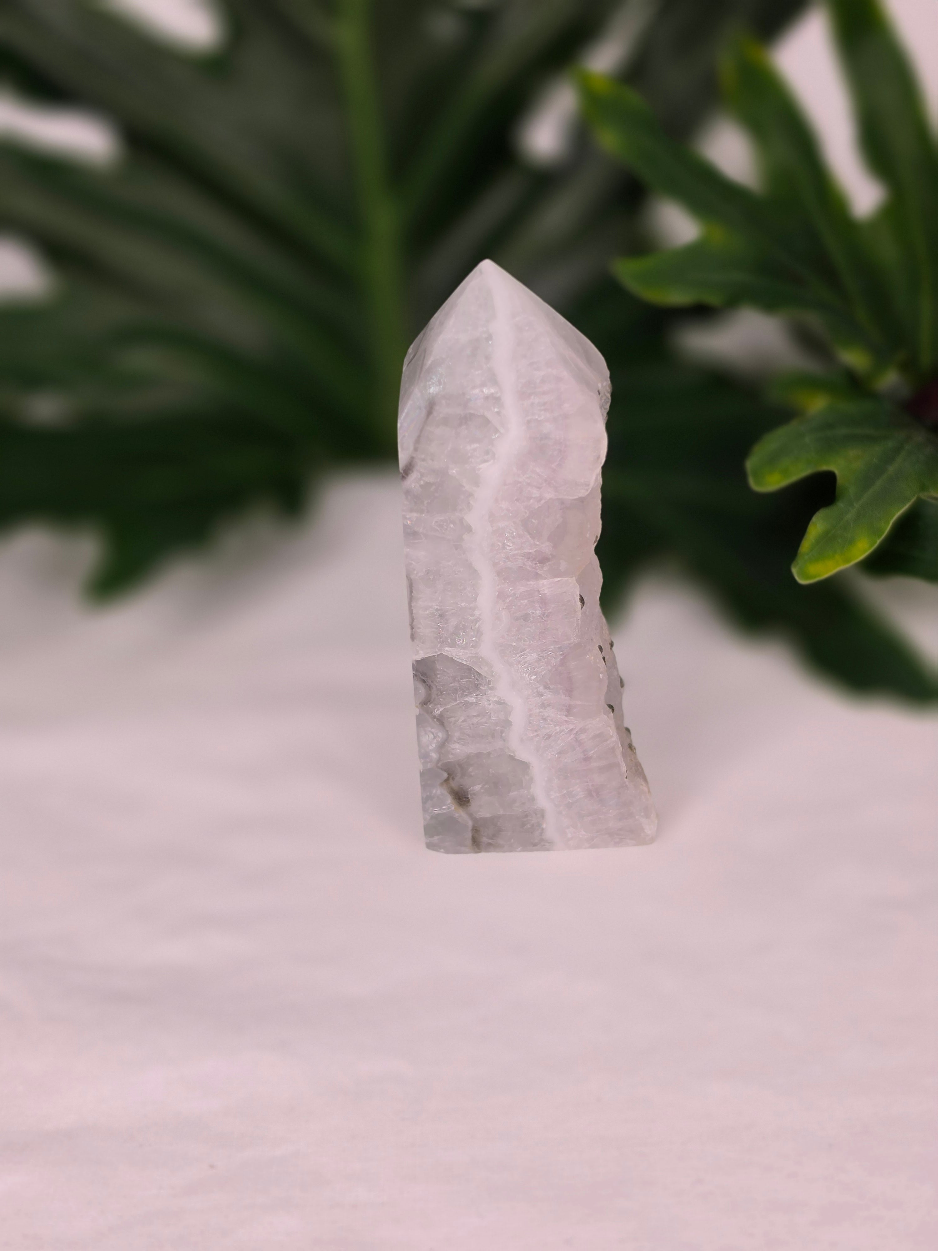 Luxury Fluorite with Pyrite Tower by Stone and Bloom featuring vibrant natural banding and golden pyrite inclusions