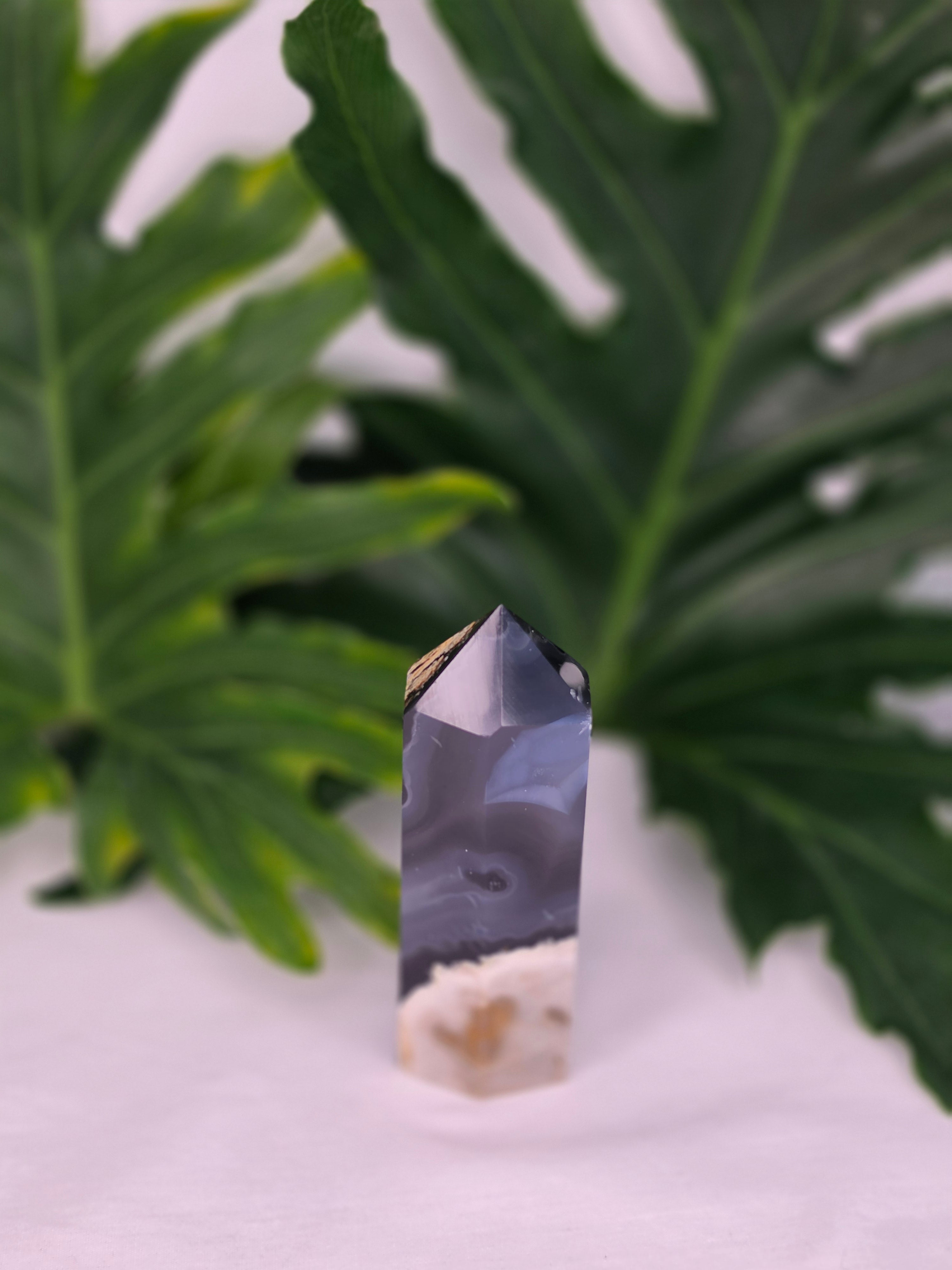 Luxury UV Reactive Volcanic Agate Tower with Druzy by Stone and Bloom featuring sparkling crystal formations