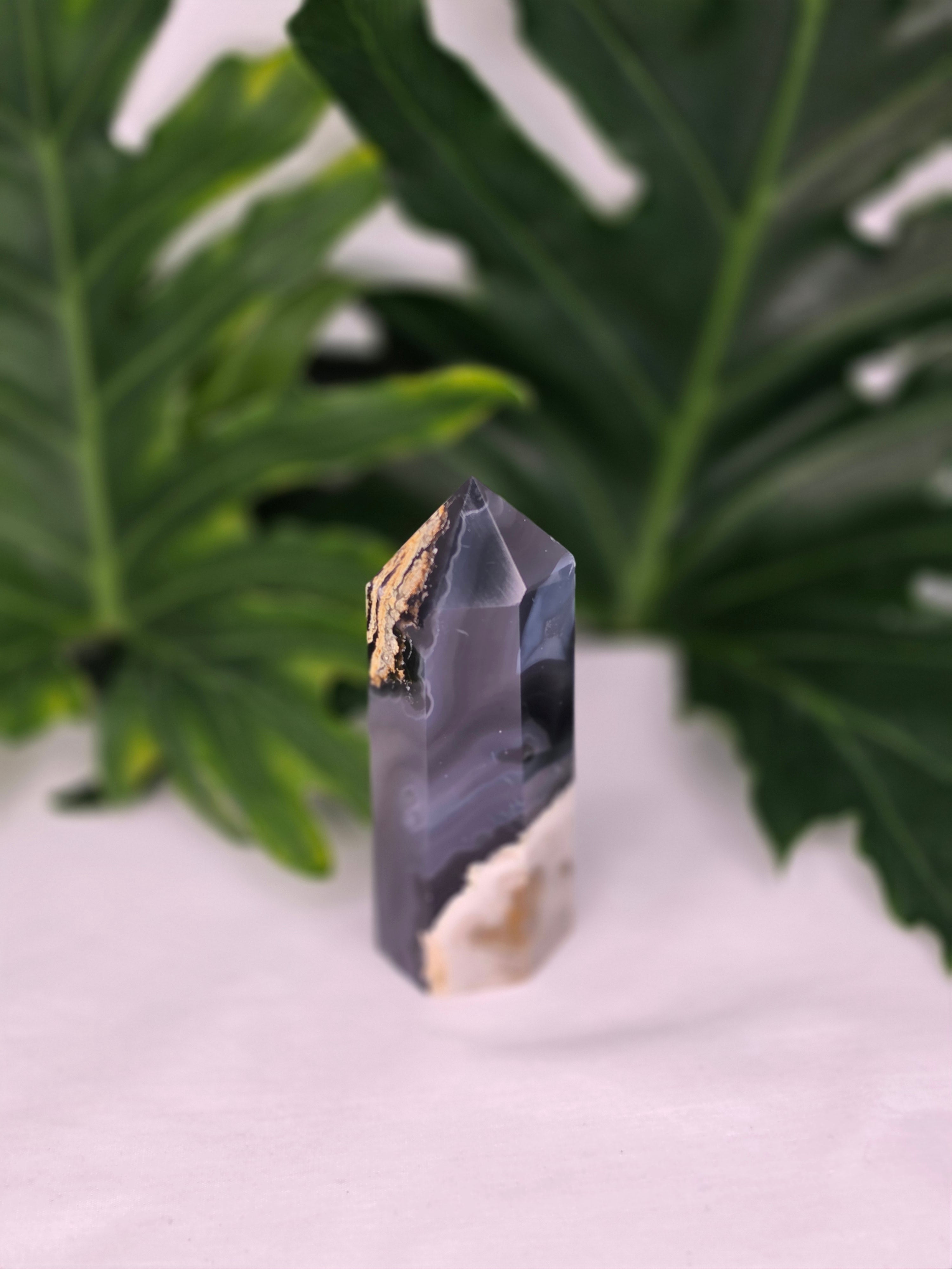 Luxury UV Reactive Volcanic Agate Tower with Druzy by Stone and Bloom featuring sparkling crystal formations