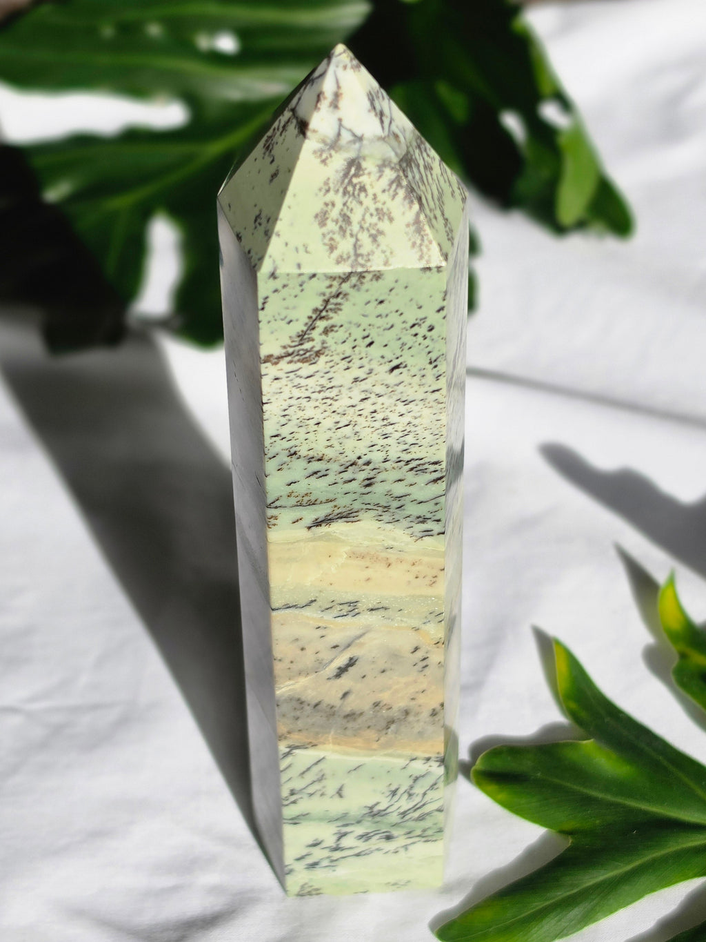 High quality Dendritic Jasper crystal tower with natural tree-like inclusions, earthy neutral tones, and premium statement décor styling by Stone and Bloom.