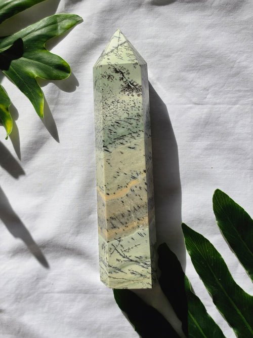 High quality Dendritic Jasper crystal tower with natural tree-like inclusions, earthy neutral tones, and premium statement décor styling by Stone and Bloom.