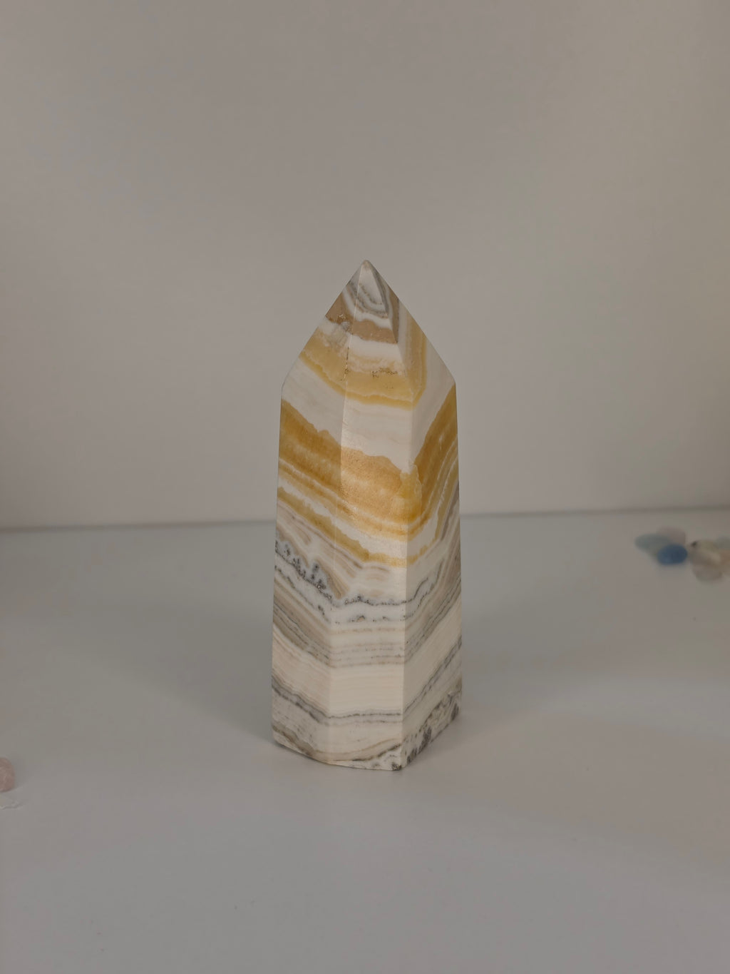 Luxury Yellow Banded Calcite Tower crystal by Stone and Bloom featuring warm golden natural banding
Yellow Banded Calcite Tower
Crystal Tower
Luxury Crystal Décor
Statement Crystal
Stone and Bloom