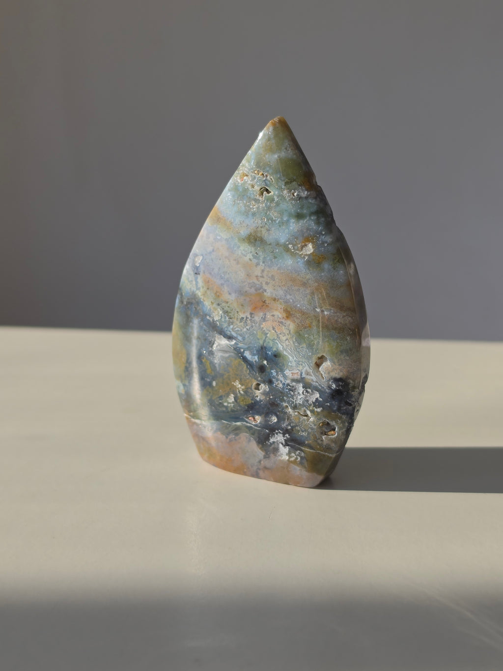 Ocean Jasper, Oceanic tones, our Ocean Jasper Flames, earthy greens, sandy creams, warm peach hues, and dreamy natural patterns, Natural Stone, Crystal Flame, Ocean Jasper Crystal, On trend, Crystal Home Decor, Home Styling