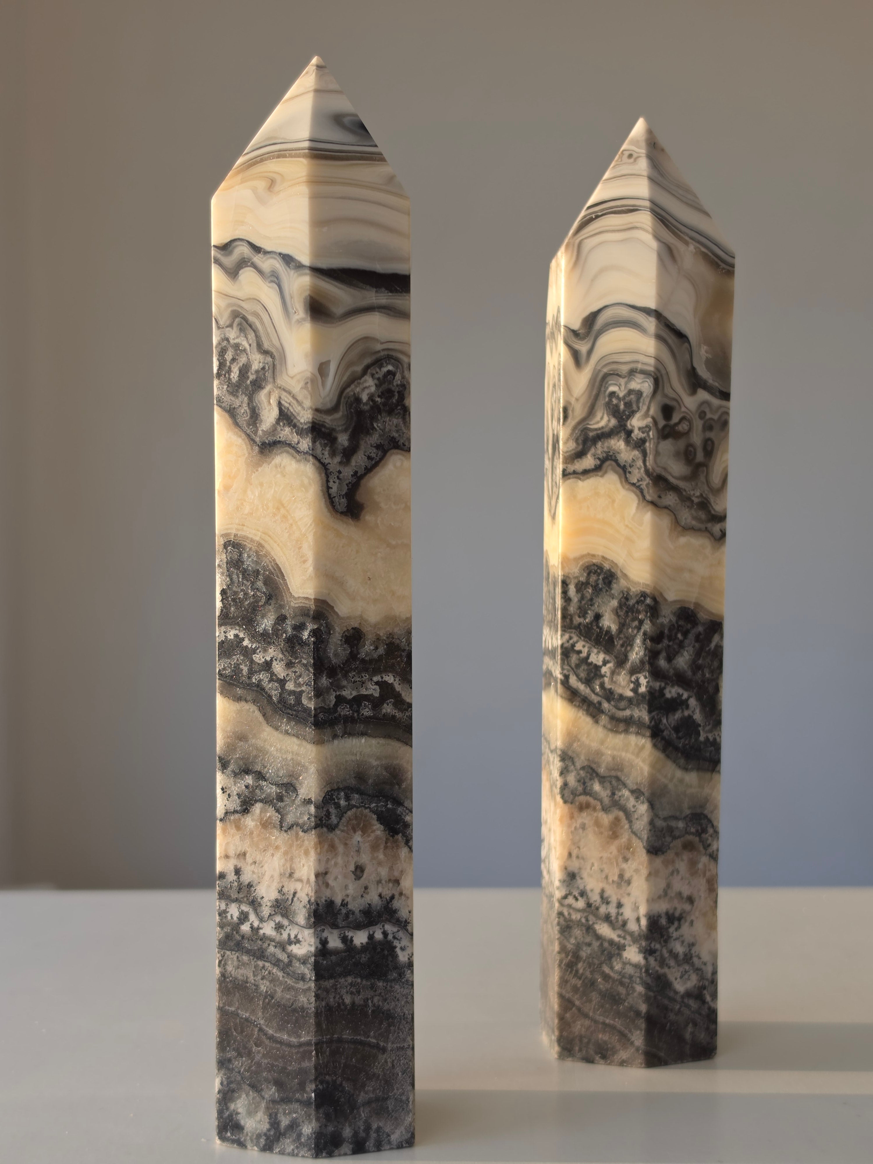 Luxury Chocolate Calcite Tower by Stone and Bloom featuring rich caramel and cream natural banding, Chocolate Calcite Tower, Crystal Tower, Luxury Crystal Décor, Statement Crystal Piece, Stone and Bloom. Home Styling, Natural Stone, On Trend