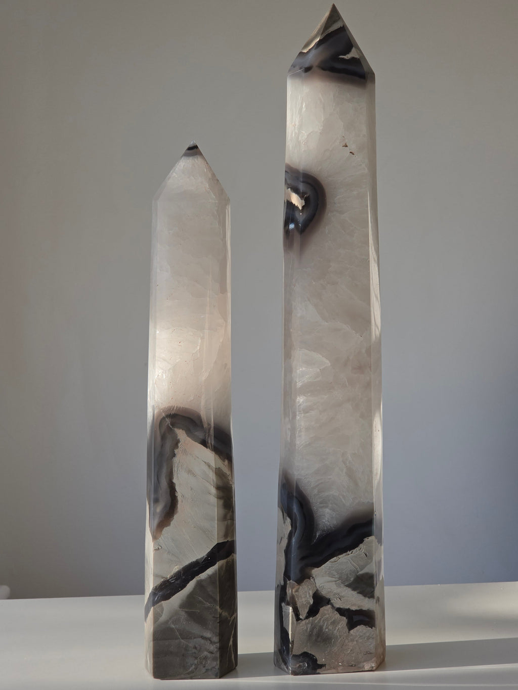 Luxury Volcanic Agate Tower by Stone and Bloom featuring natural druzy crystal formations, earthy volcanic tones, and intricate landscape-like patterns curated as a premium statement piece.