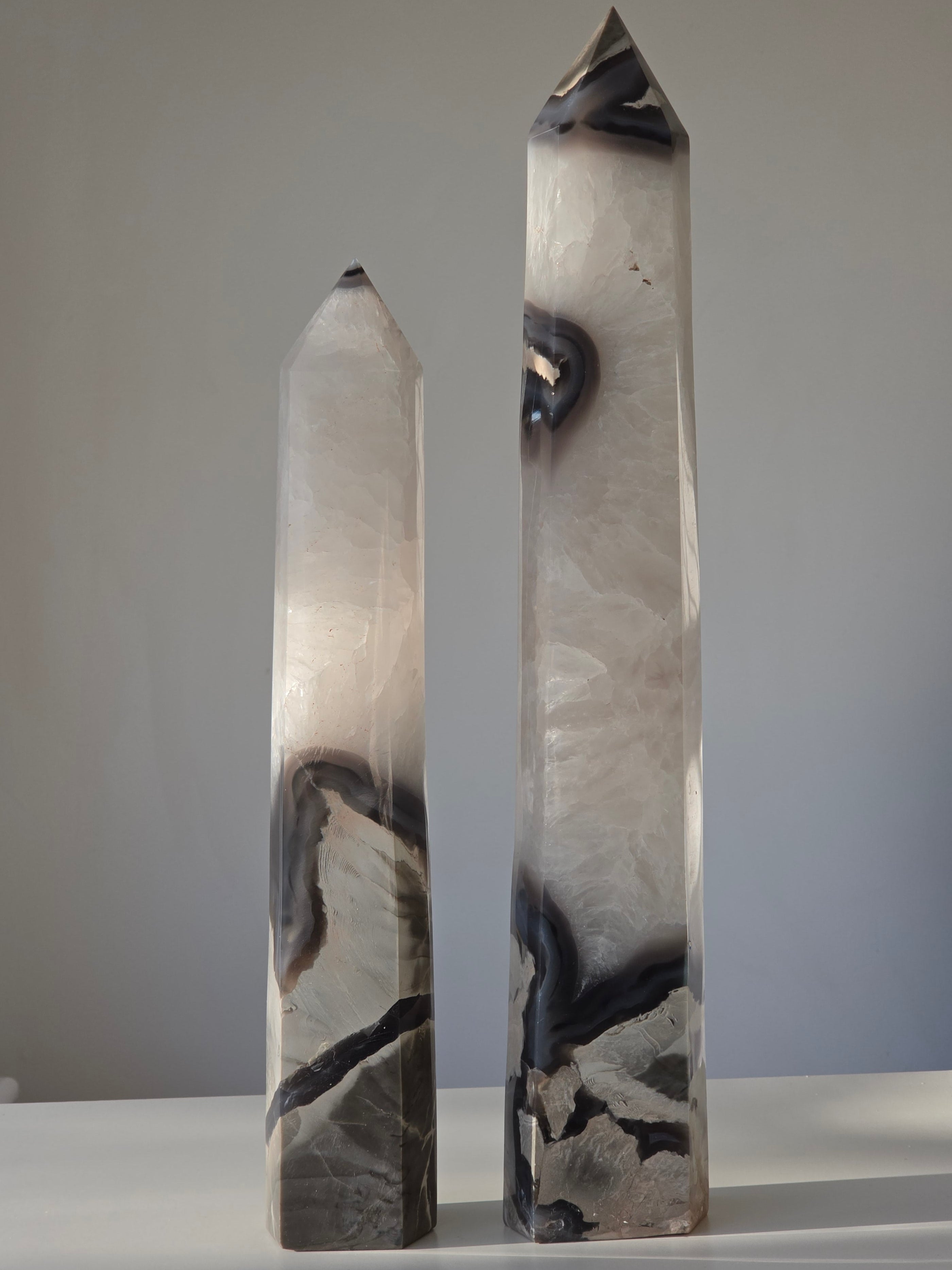 Luxury Volcanic Agate Tower by Stone and Bloom featuring natural druzy crystal formations, earthy volcanic tones, and intricate landscape-like patterns curated as a premium statement piece.