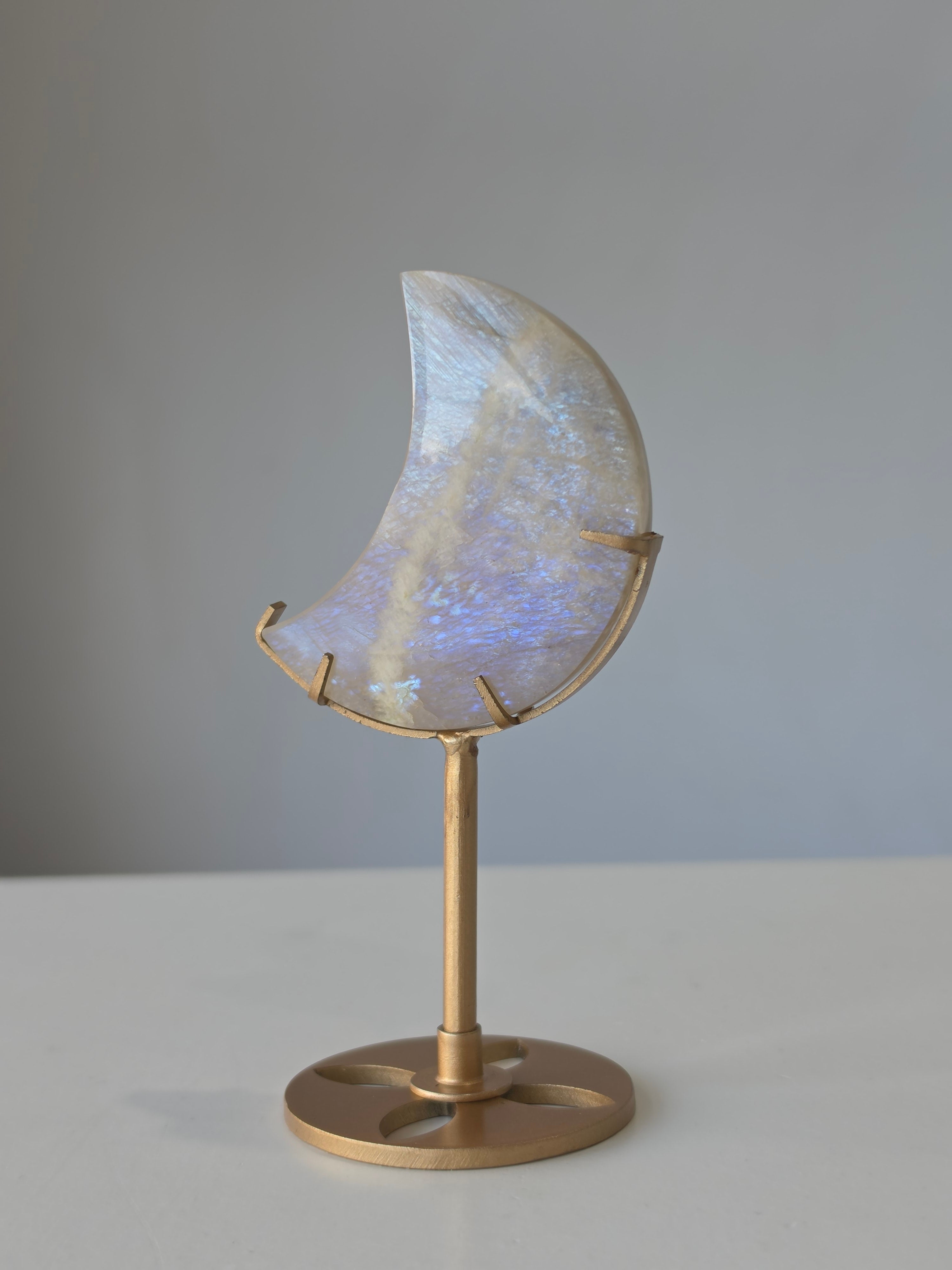 Luxury Moonstone Moon on Stand by Stone and Bloom featuring luminous pearlescent flashes and celestial beauty,  luxe high end, on trend, moon crystal, Natural Stone, home styling