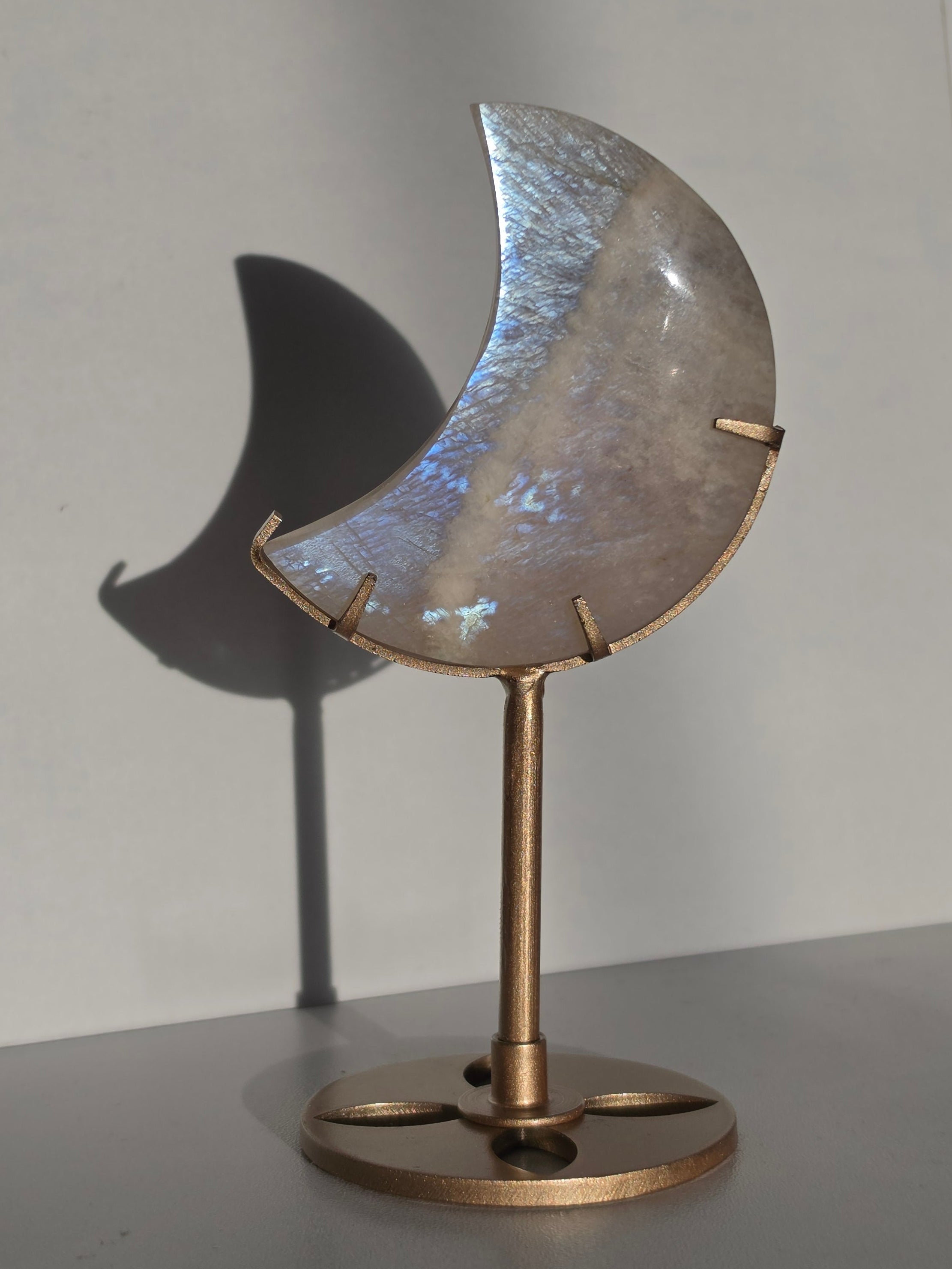 Luxury Moonstone Moon on Stand by Stone and Bloom featuring luminous pearlescent flashes and celestial beauty