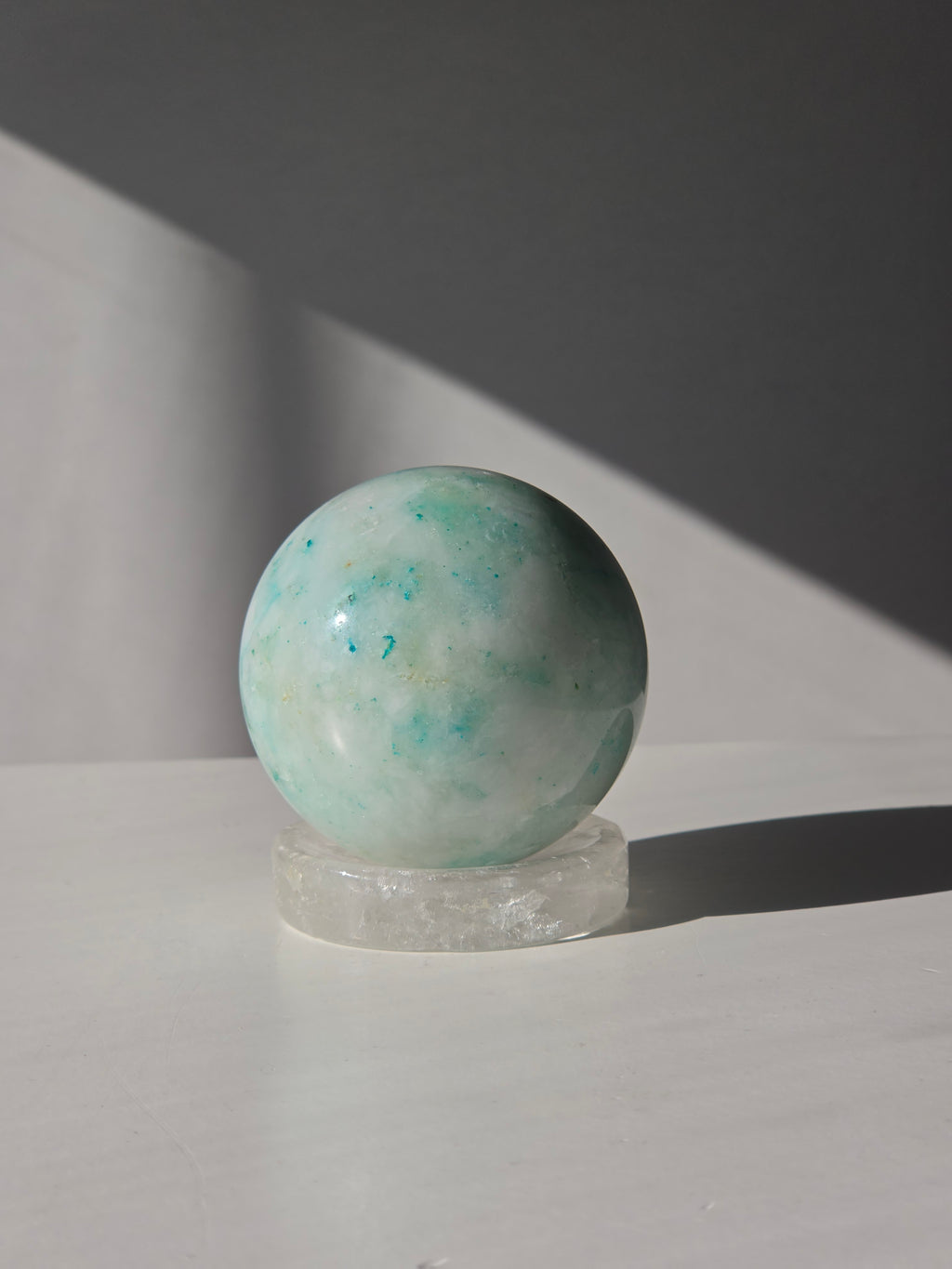 Luxury Phoenix Stone Tower by Stone and Bloom featuring vibrant turquoise, sage green, and earthy natural formations