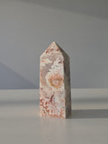 High quality Pink Mexican Lace Agate crystal tower with soft rose tones, natural lace patterns, and elegant statement décor styling by Stone and Bloom