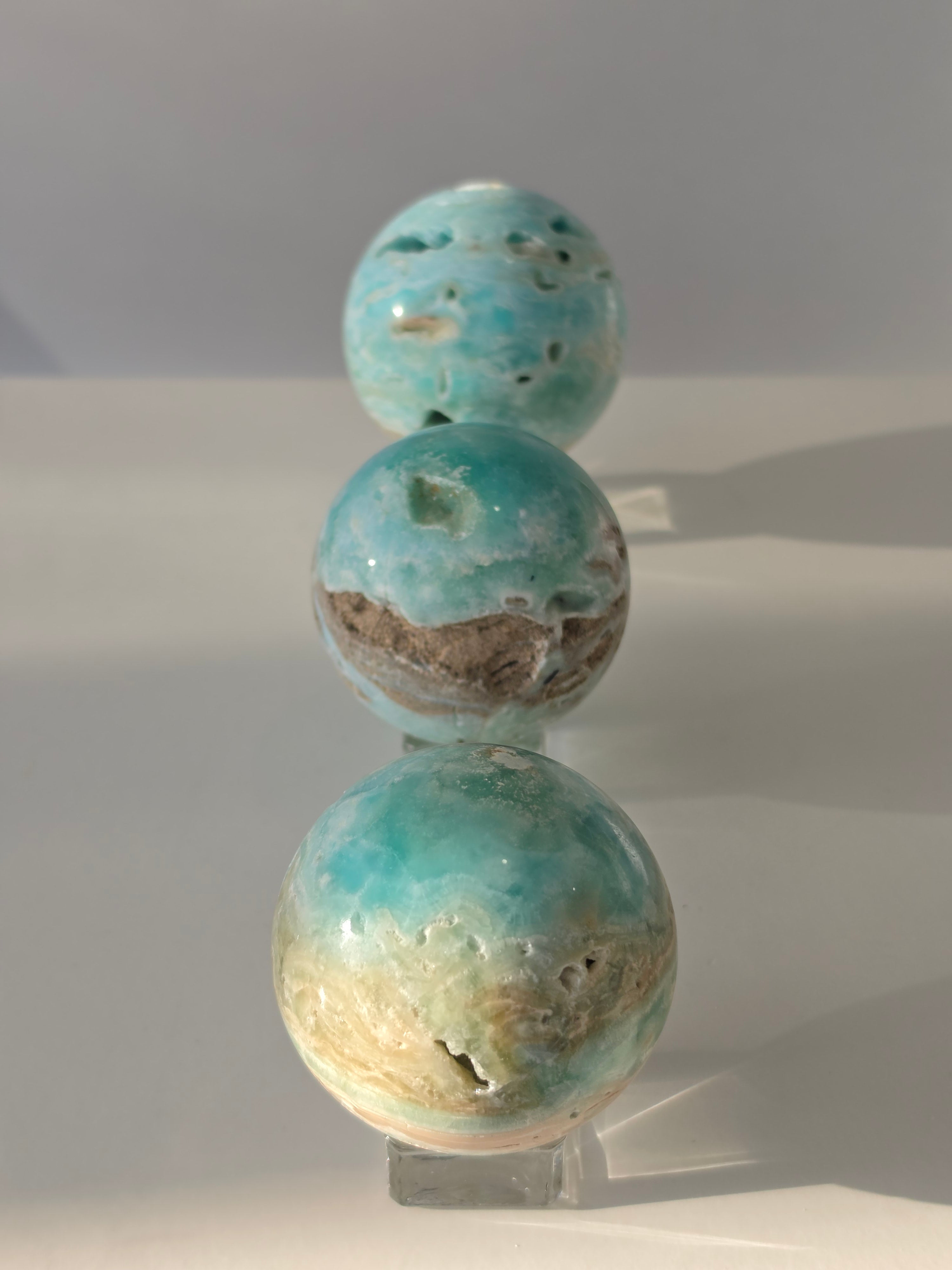 Luxury Hemimorphite Heart by Stone and Bloom featuring serene sky-blue tones, natural mineral formations, and premium polished craftsmanship.
