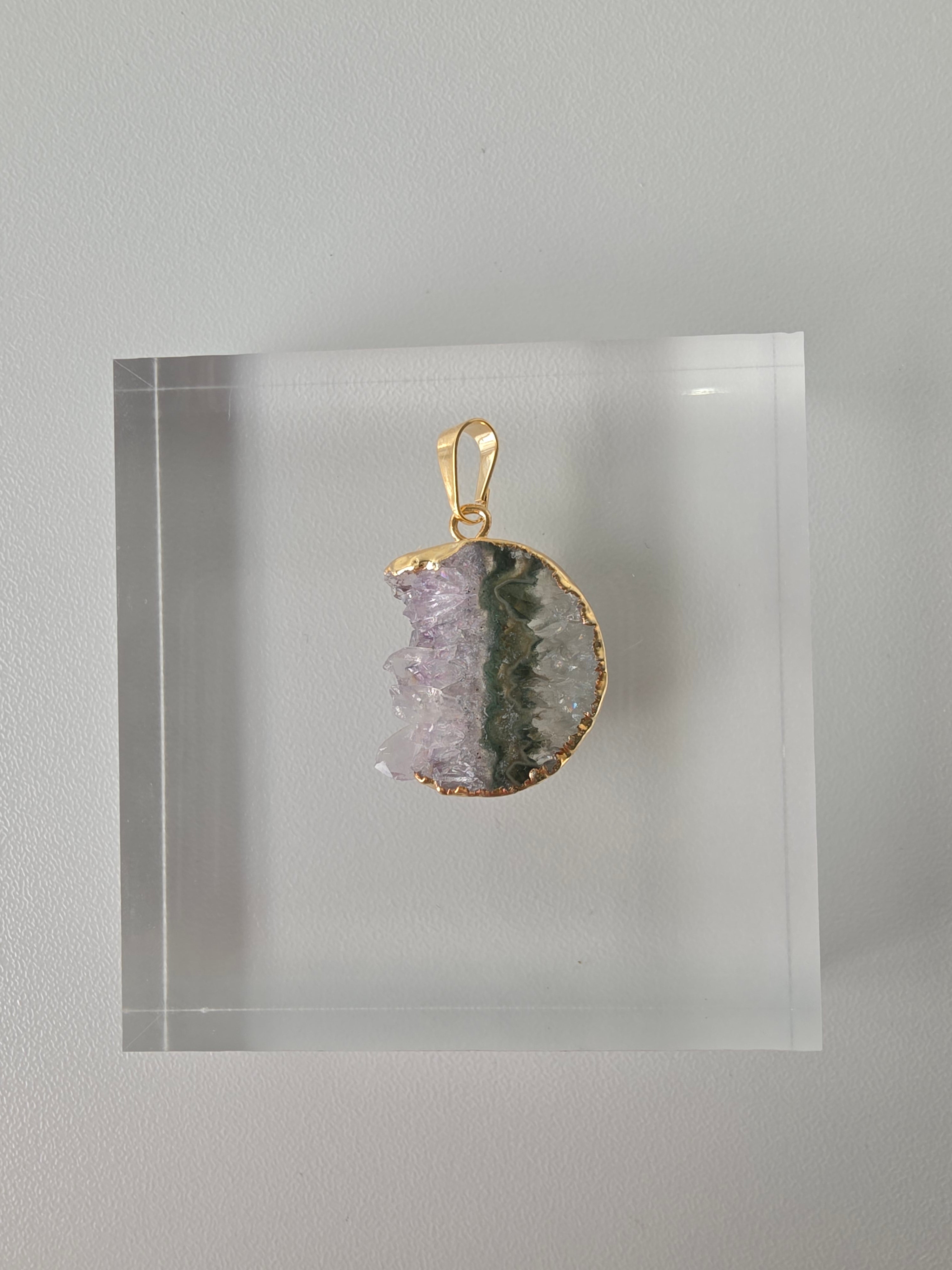 Natural Amethyst Slice Moon Pendant, raw crystal druzy pendant in a gold-plated setting from the Stone & Bloom Raw Luxe Collection.