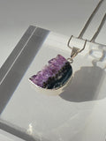 Natural Amethyst Slice Moon Pendant, raw crystal druzy pendant in a silver-plated setting from the Stone & Bloom Raw Luxe Collection.