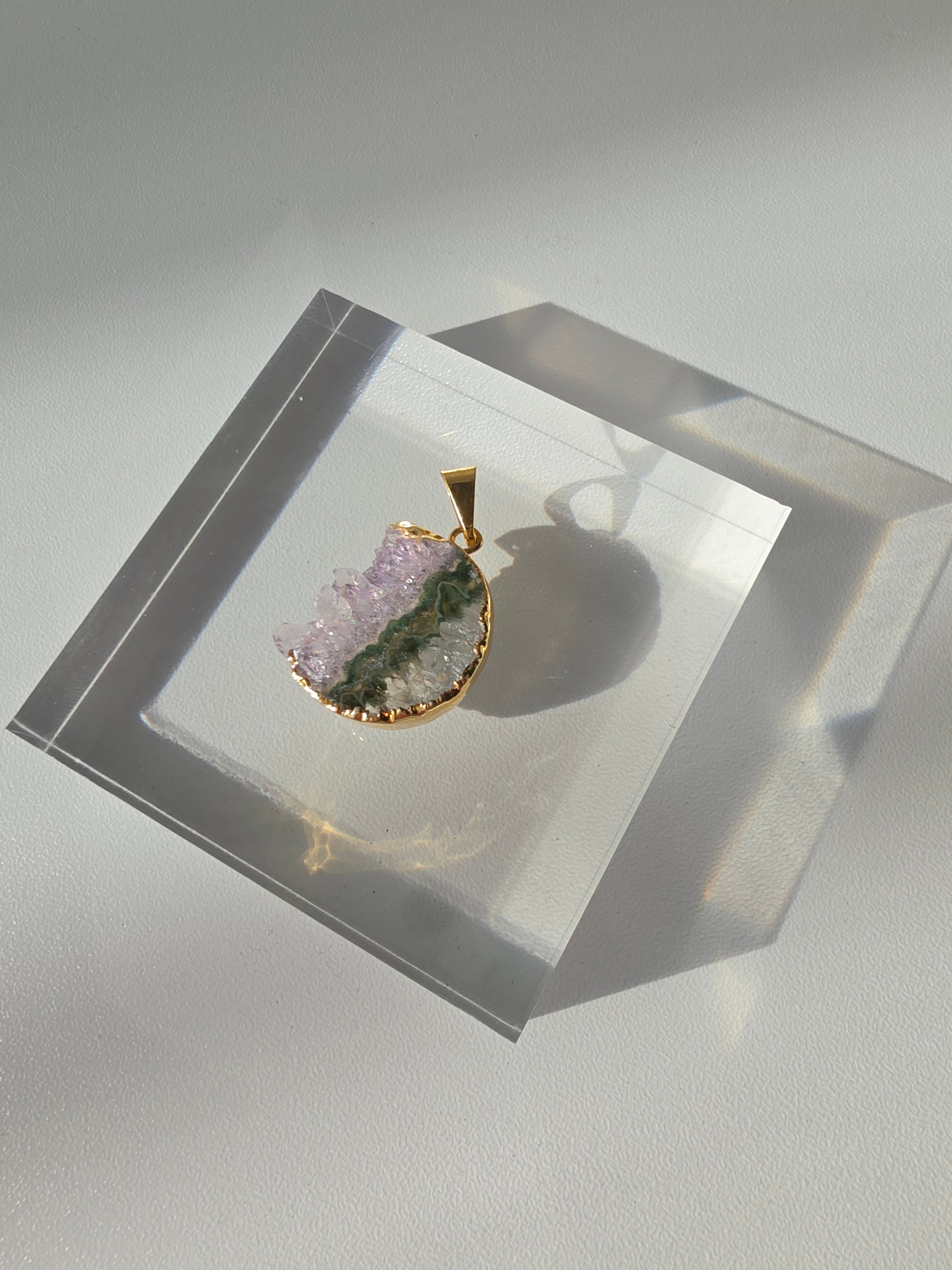 Natural Amethyst Slice Moon Pendant, raw crystal druzy pendant in a gold-plated setting from the Stone & Bloom Raw Luxe Collection.