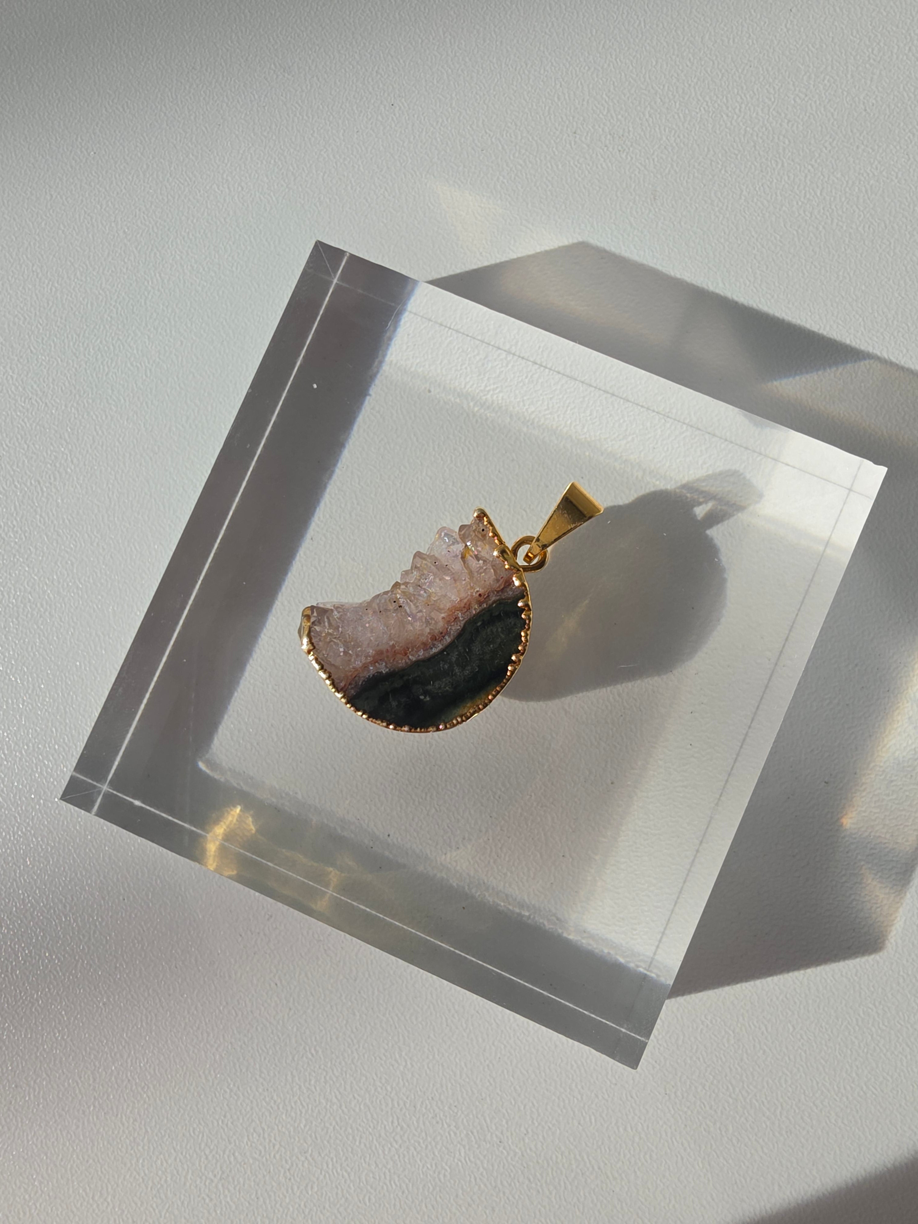 Natural Amethyst Slice Moon Pendant, raw crystal druzy pendant in a gold-plated setting from the Stone & Bloom Raw Luxe Collection.