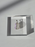 Natural Amethyst Slice Moon Pendant, raw crystal druzy pendant in a silver-plated hypoallergenic setting from the Stone & Bloom Raw Luxe Collection.