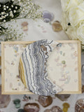 Luxury Yellow Banded Calcite Moon on Stand by Stone and Bloom featuring warm golden tones and natural creamy banding