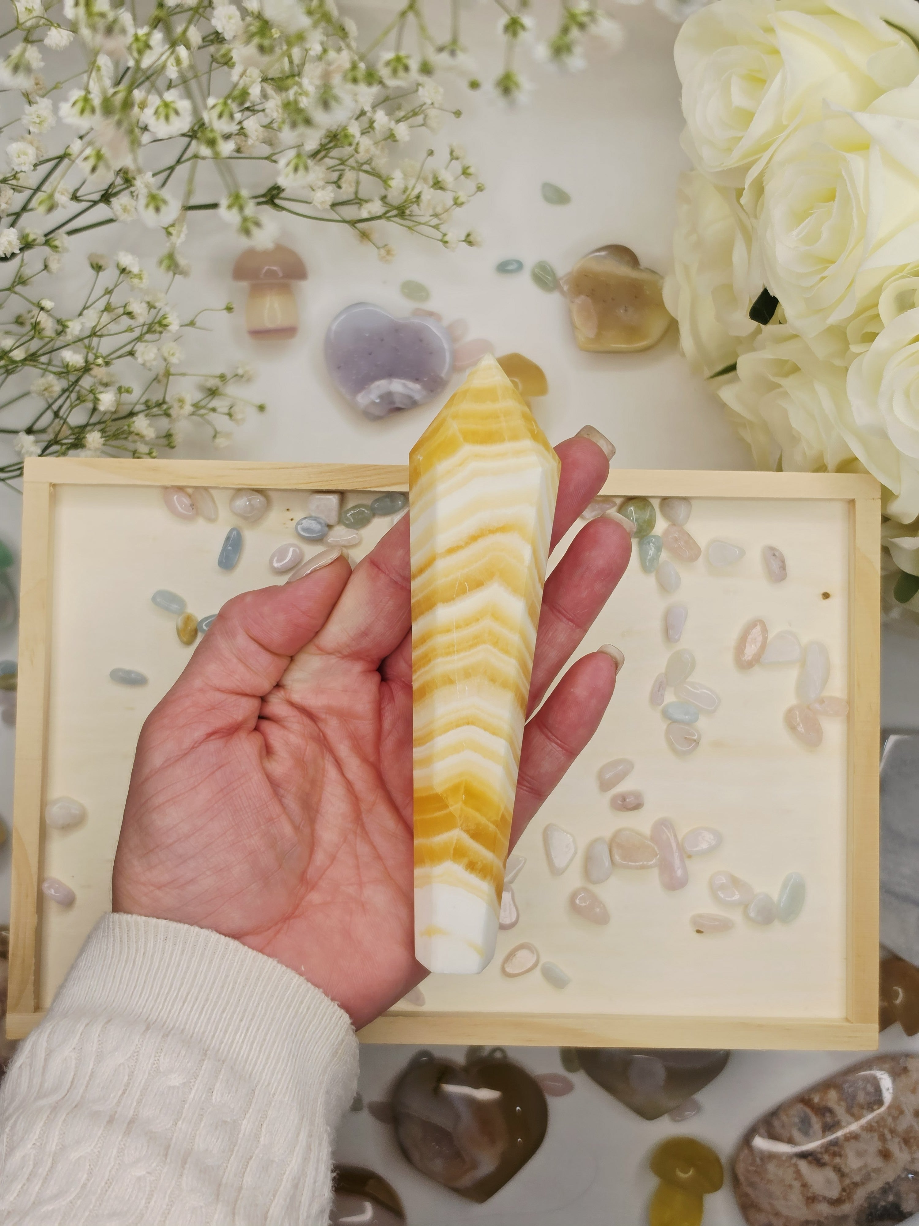 Luxury Yellow Banded Calcite Wand by Stone and Bloom featuring warm golden and cream natural banding, on trend