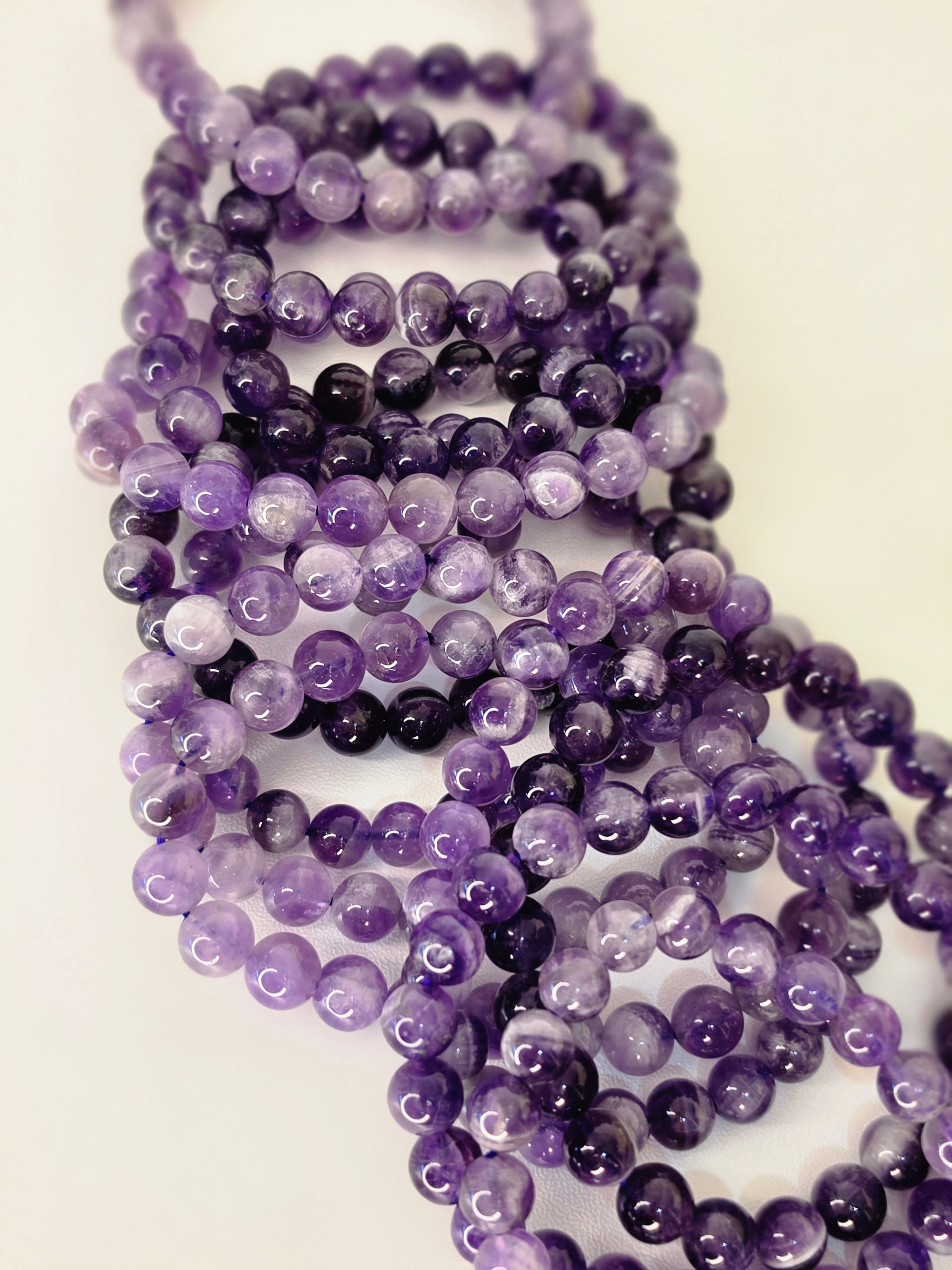 Luxury Dream Amethyst Crystal Bracelet by Stone and Bloom featuring soft purple natural banding
Dream Amethyst Bracelet
Crystal Bracelet
Chevron Amethyst
Luxury Crystal Jewellery
Stone and Bloom