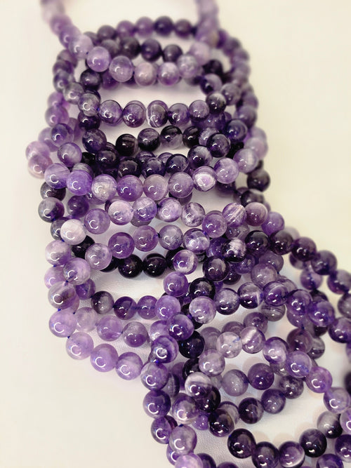 Luxury Dream Amethyst Crystal Bracelet by Stone and Bloom featuring soft purple natural banding
Dream Amethyst Bracelet
Crystal Bracelet
Chevron Amethyst
Luxury Crystal Jewellery
Stone and Bloom
