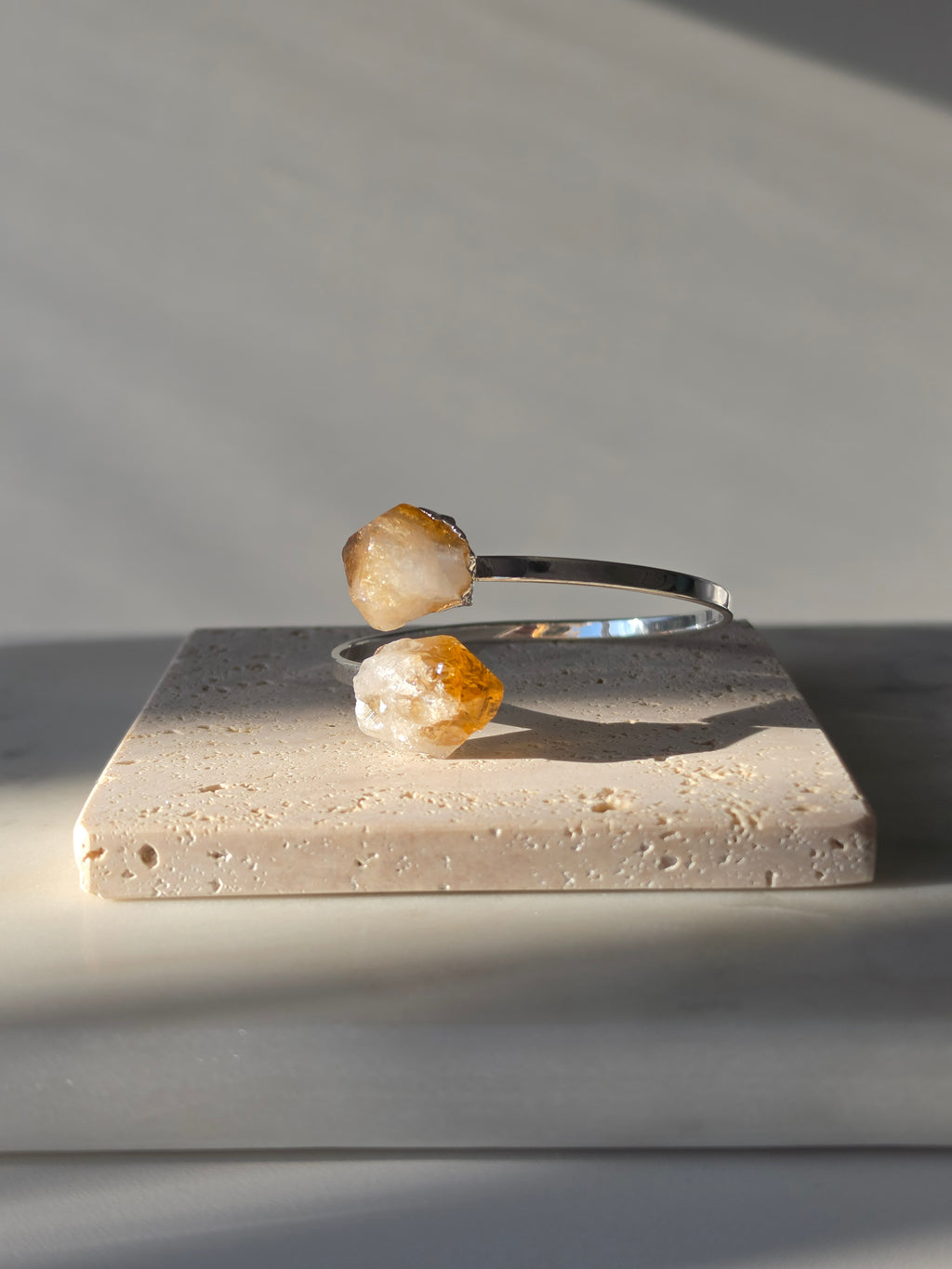 Stone & Bloom Raw Luxe Brazilian Rough Citrine wrap bracelet with genuine rough Citrine crystals and premium 1-micron silver plating on an elegant open cuff.