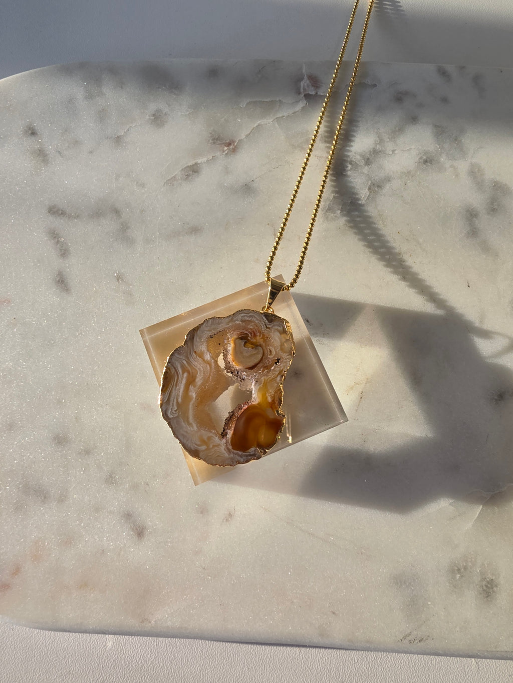 "Brazilian Agate Geode Slice Pendant in natural [brown/black/grey] tones 24K gold plated with sparkling druzy crystal formations"