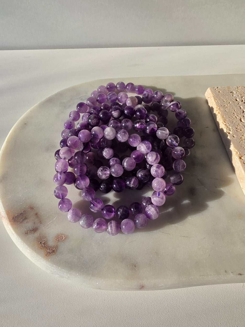Luxury Dream Amethyst Crystal Bracelet by Stone and Bloom featuring soft purple natural banding
Dream Amethyst Bracelet
Crystal Bracelet
Chevron Amethyst
Luxury Crystal Jewellery
Stone and Bloom