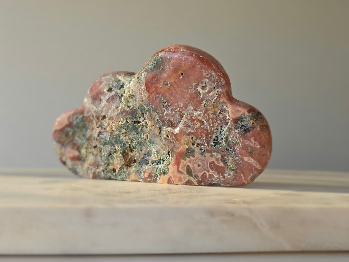 Natural Brazilian Pink Amethyst Cloud with soft blush pink and peach tones, subtle mineral inclusions and organic sculptural shape