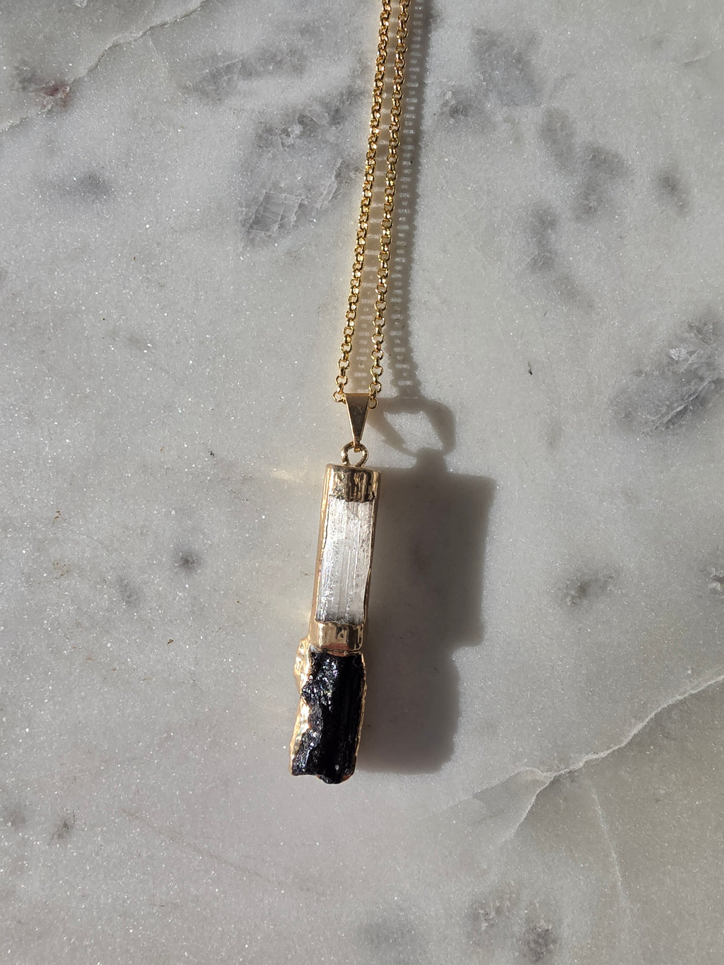 Natural Selenite and Black Tourmaline crystal pendant in a refined 24K Gold Plated setting, Stone & Bloom Raw Luxe Collection