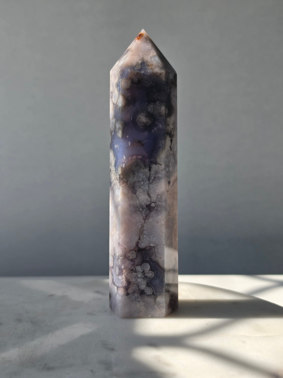 Blue Flower Agate crystal point with soft blue, lavender and cream tones and natural flower-like plume inclusions