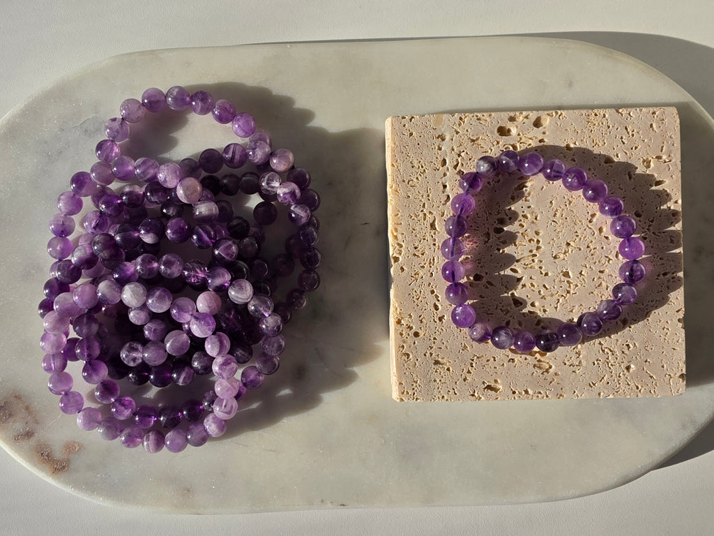 Luxury Dream Amethyst Crystal Bracelet by Stone and Bloom featuring soft purple natural banding
Dream Amethyst Bracelet
Crystal Bracelet
Chevron Amethyst
Luxury Crystal Jewellery
Stone and Bloom