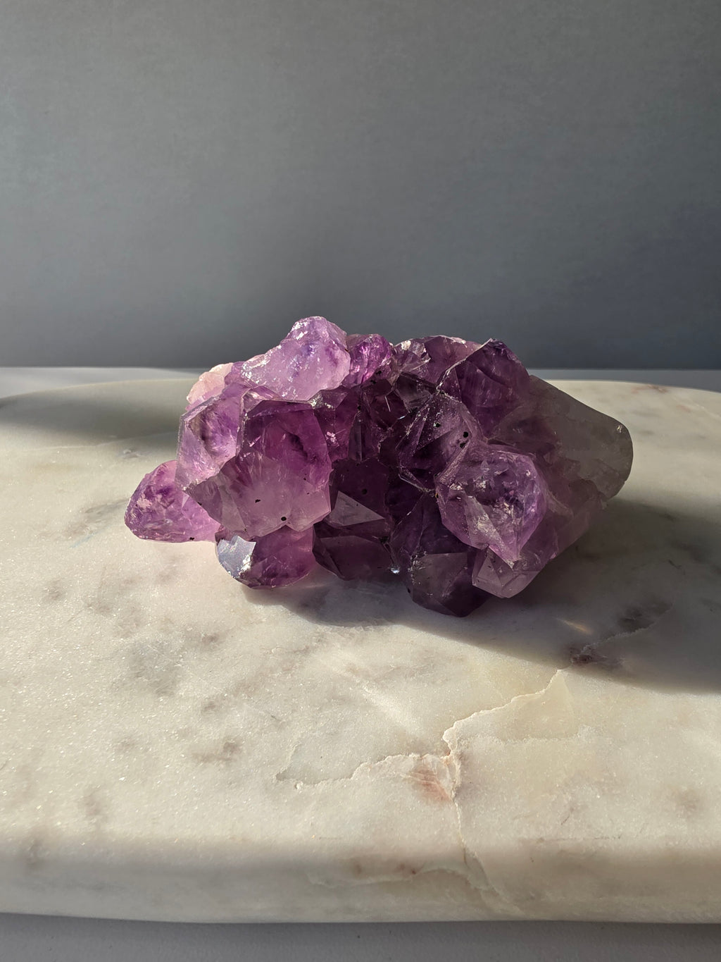 Intense purple Amethyst polished freeform with raw chunky crystal formations and natural Goethite and Hematite inclusions