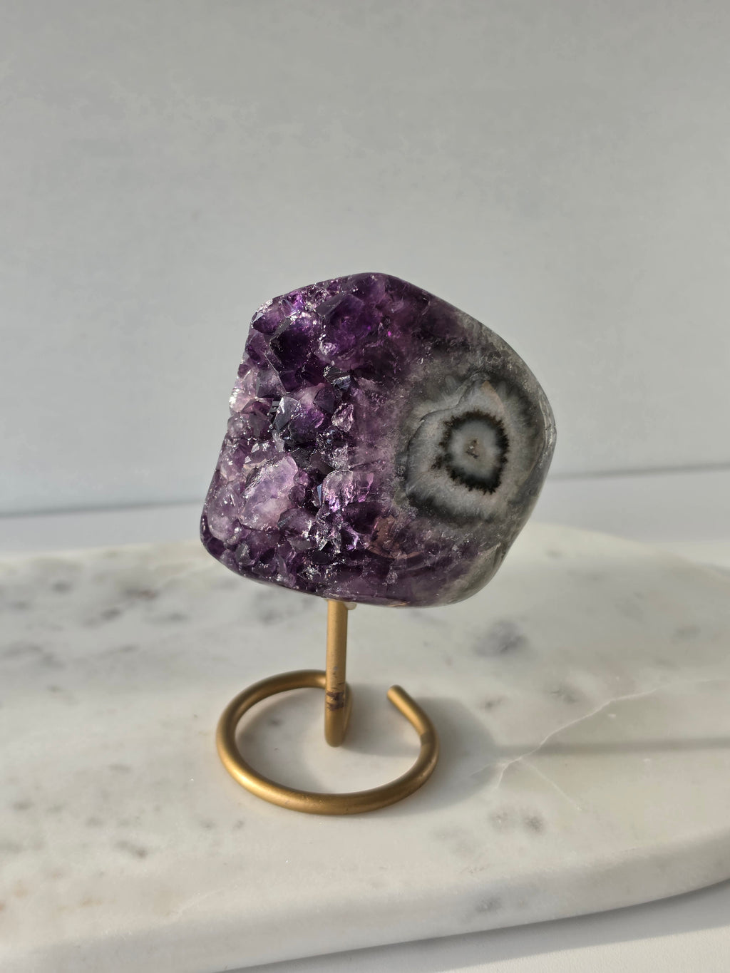 Natural Deep Purple Amethyst Stalactite on a gold display stand