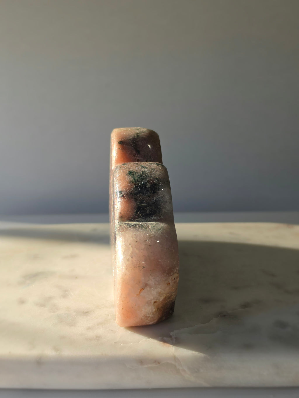 Natural Brazilian Pink Amethyst Cloud with soft blush pink and peach tones, unique blue-green mineral inclusions and polished sculptural finish