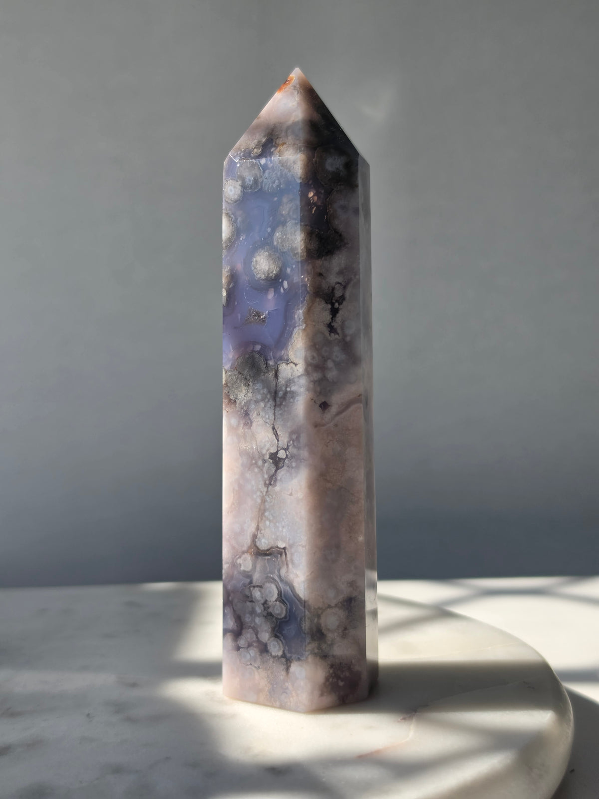 Blue Flower Agate crystal point with soft blue, lavender and cream tones and natural flower-like plume inclusions