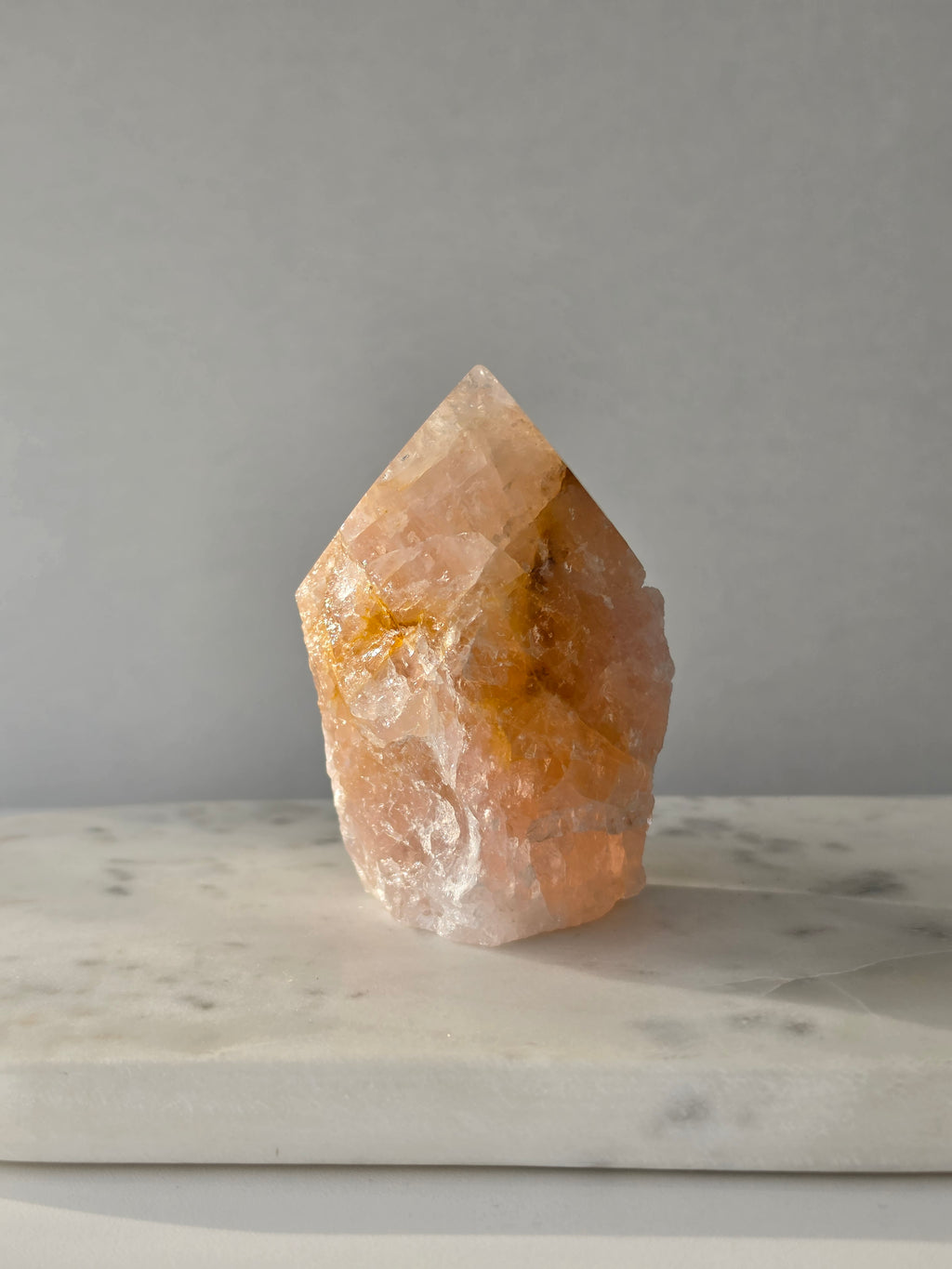 Chunky Rose Quartz and Golden Healer Quartz tower with soft blush pink colouring, warm golden inclusions and a combination of raw crystal texture and polished surfaces