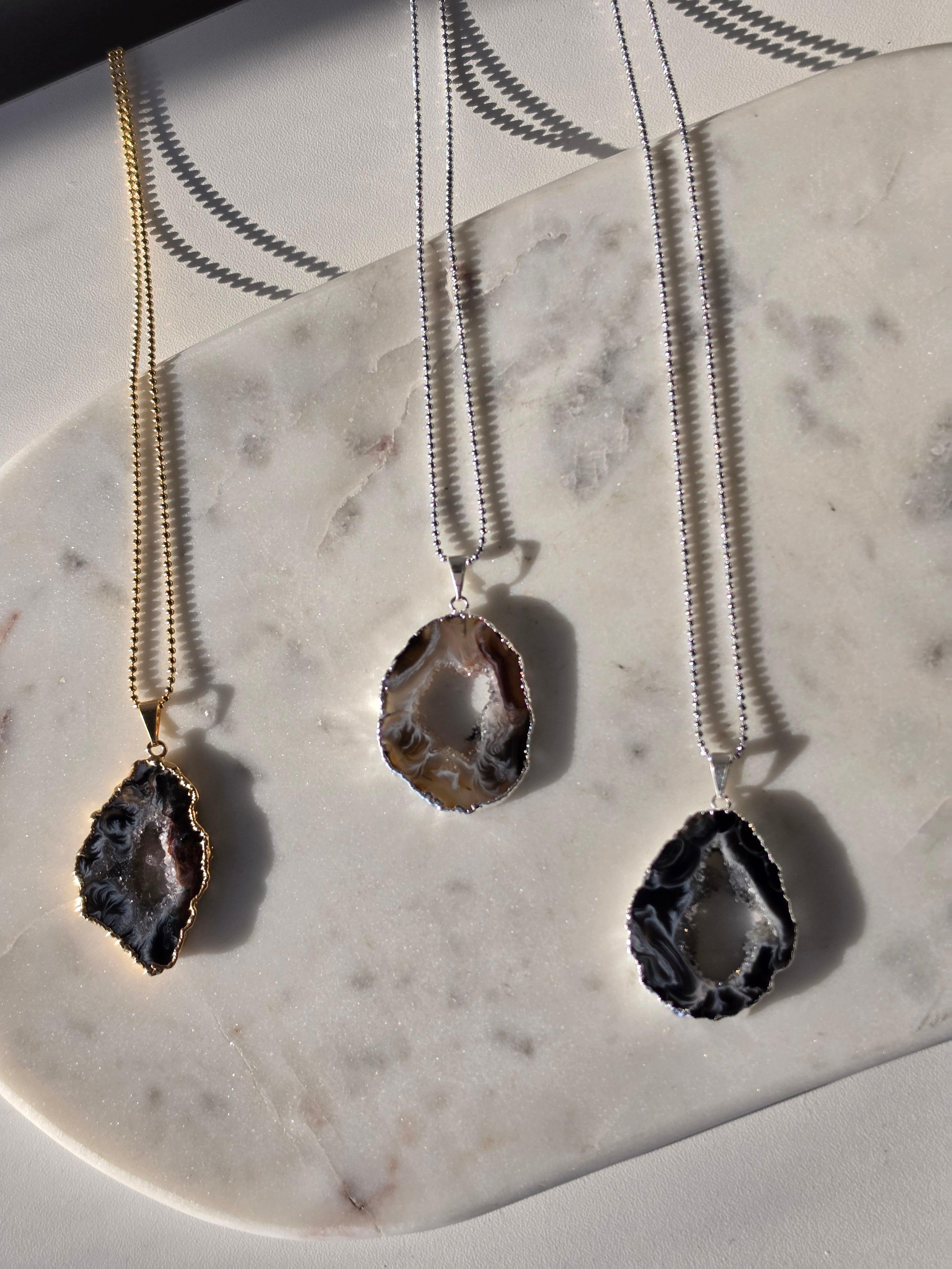 "Brazilian Agate Geode Slice Pendant in natural [brown/black/grey] tones 24K gold plated with sparkling druzy crystal formations"