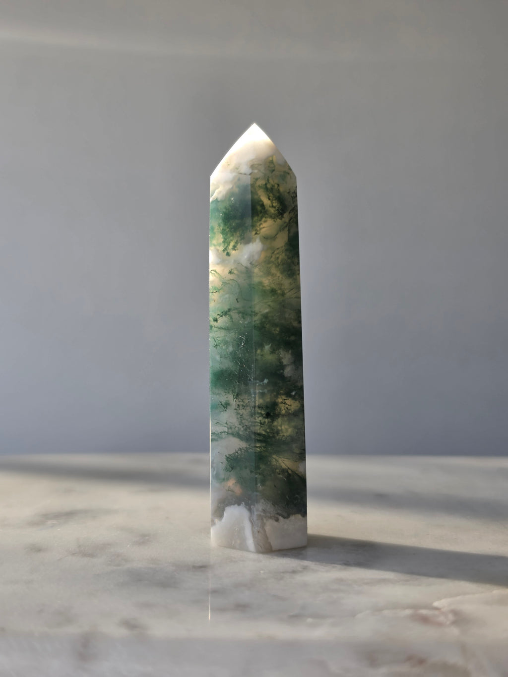 Moss Agate crystal point with translucent milky quartz and intricate forest green botanical inclusions