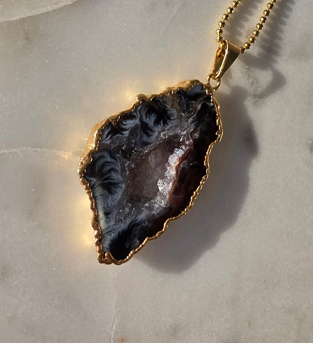 "Brazilian Agate Geode Slice Pendant in natural [brown/black/grey] tones 24K gold plated with sparkling druzy crystal formations"