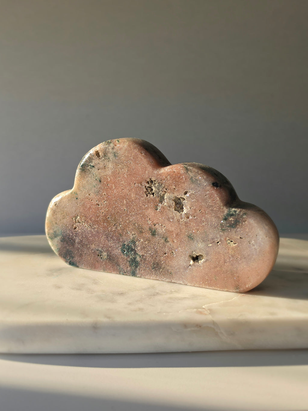 Natural Brazilian Pink Amethyst Cloud with soft blush pink and peach tones, unique blue-green mineral inclusions and polished sculptural finish