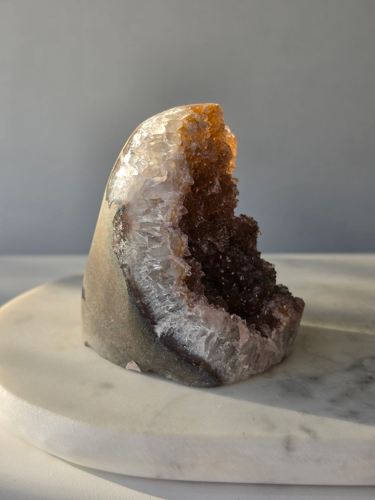 Druzy Golden Amethyst cut base from Uruguay with intensely sparkling crystal druzy surface and warm golden lilac and pink tones 482g 10cm