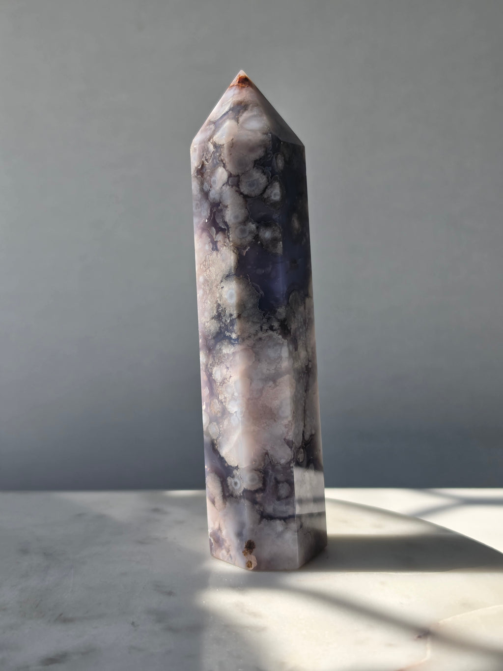 Blue Flower Agate crystal point with soft blue, lavender and cream tones and natural flower-like plume inclusions