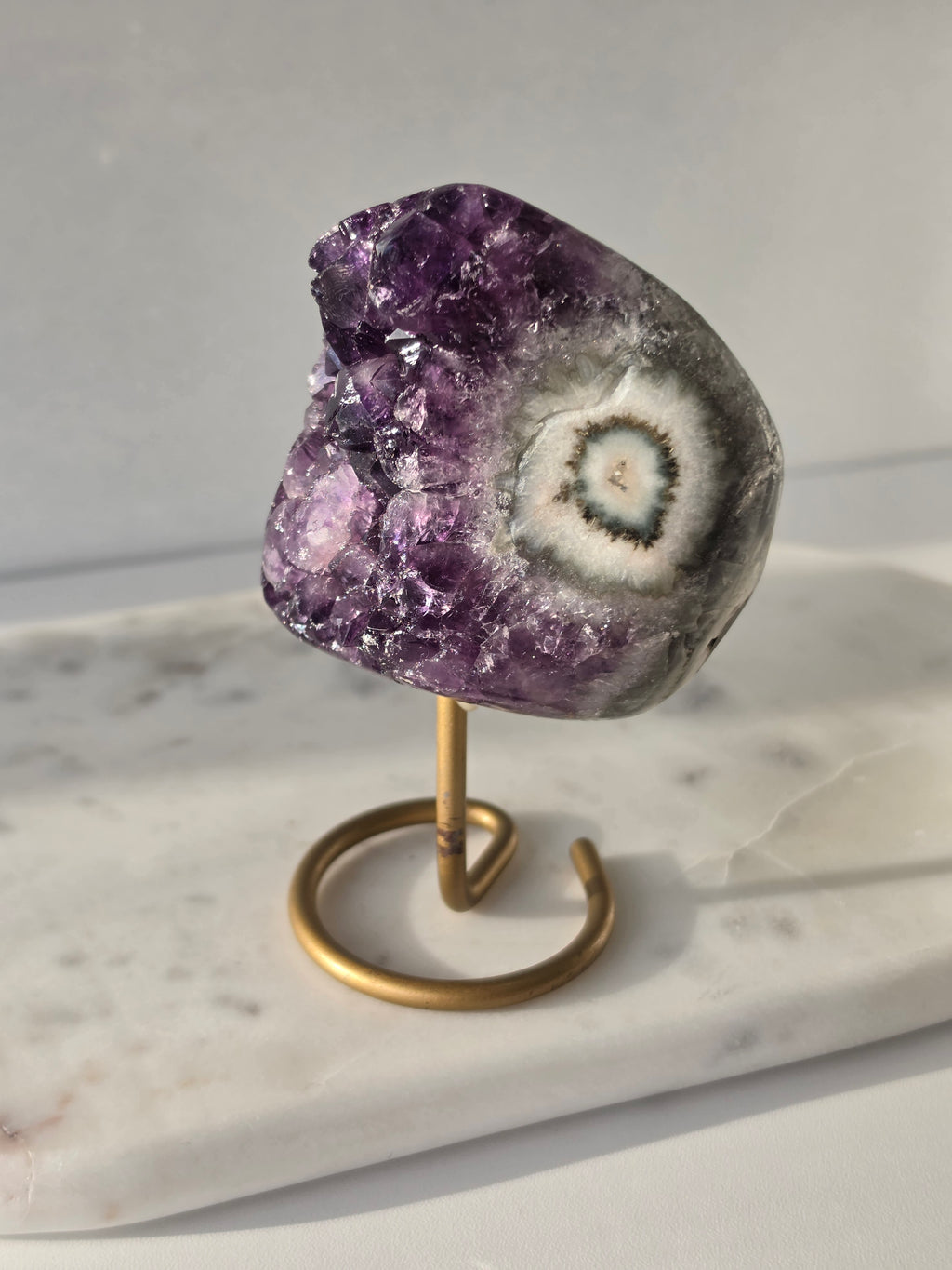 Natural Deep Purple Amethyst Stalactite on a gold display stand