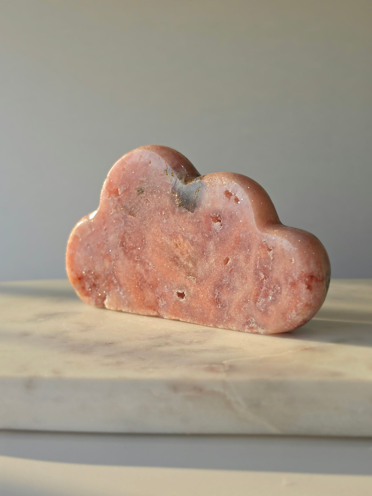Natural Brazilian Pink Amethyst Cloud with soft blush pink and peach tones, subtle mineral inclusions and organic sculptural shape