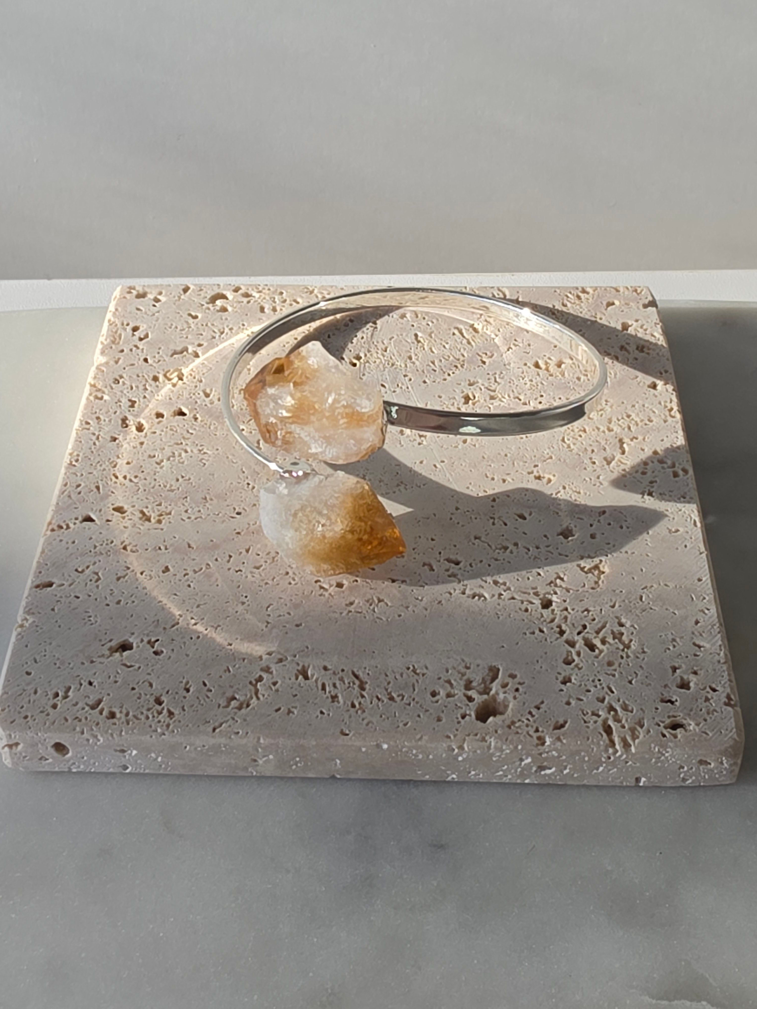 Stone & Bloom Raw Luxe Brazilian Rough Citrine wrap bracelet with genuine rough Citrine crystals and premium 1-micron silver plating on an elegant open cuff.