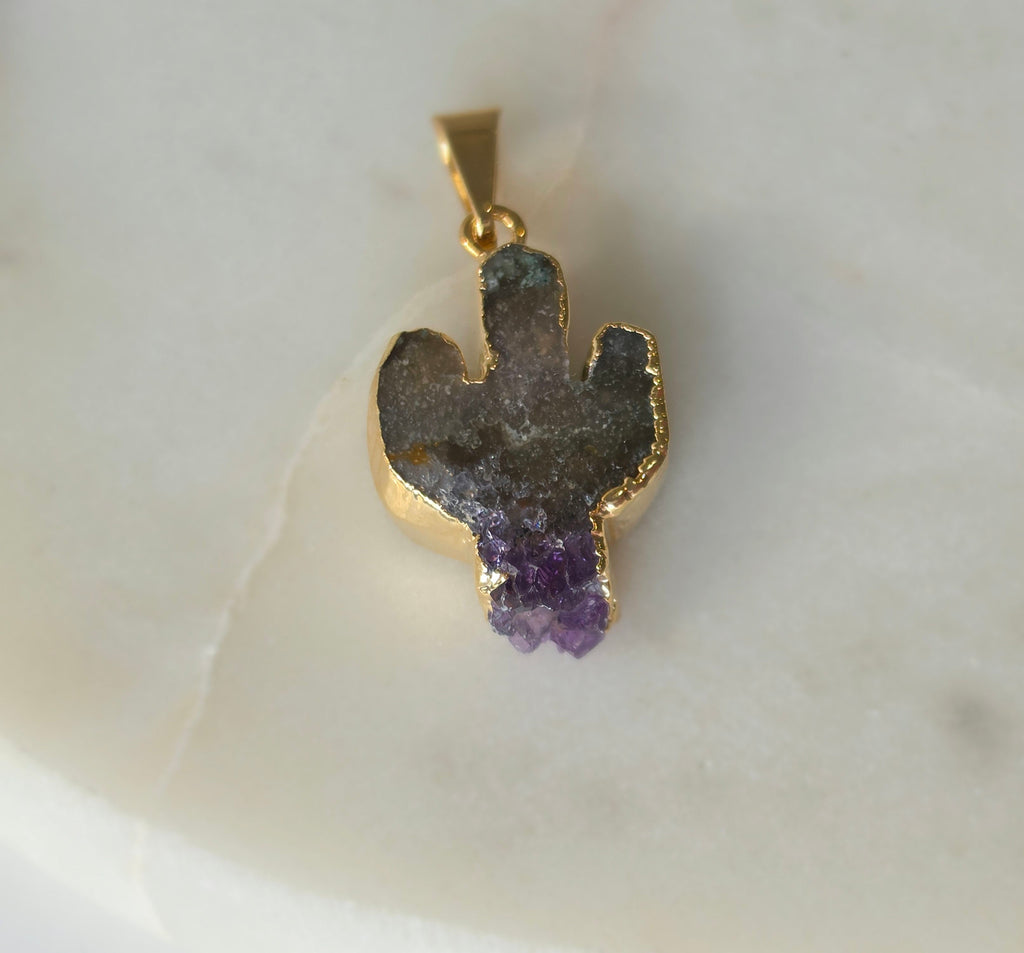 Amethyst and agate cactus slice pendant featuring deep smoky-grey agate, purple crystal formations and a 24K gold-plated outline.